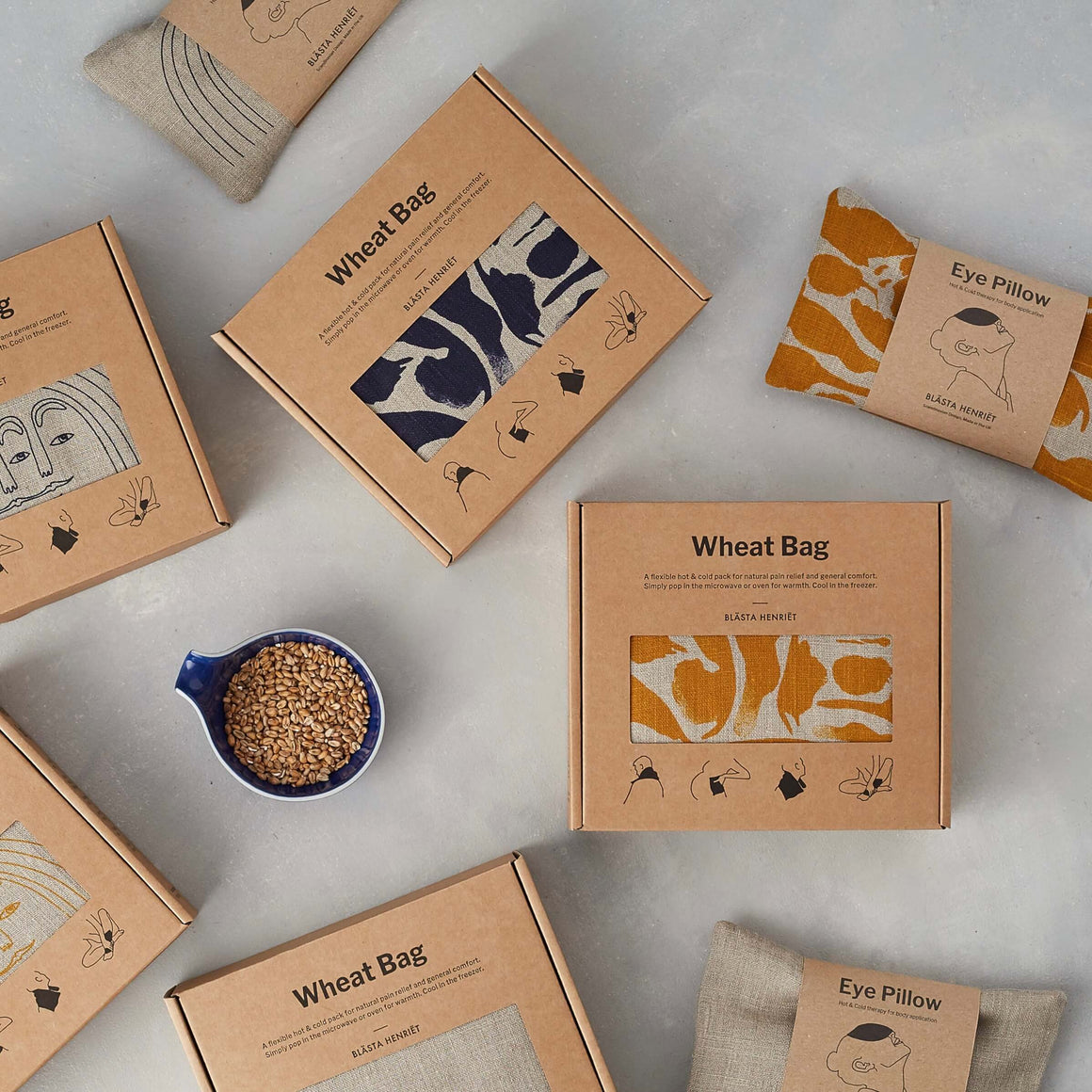 wheat bags in linen displayed together 